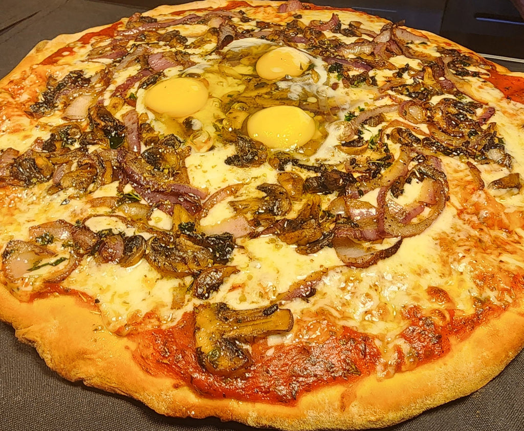 Pizza with various toppings on a countertop